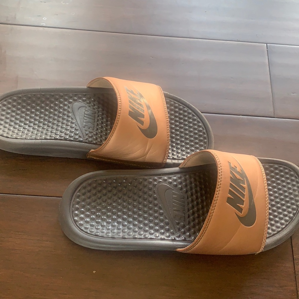 Copper and Black Nike slides size: Women’s 9